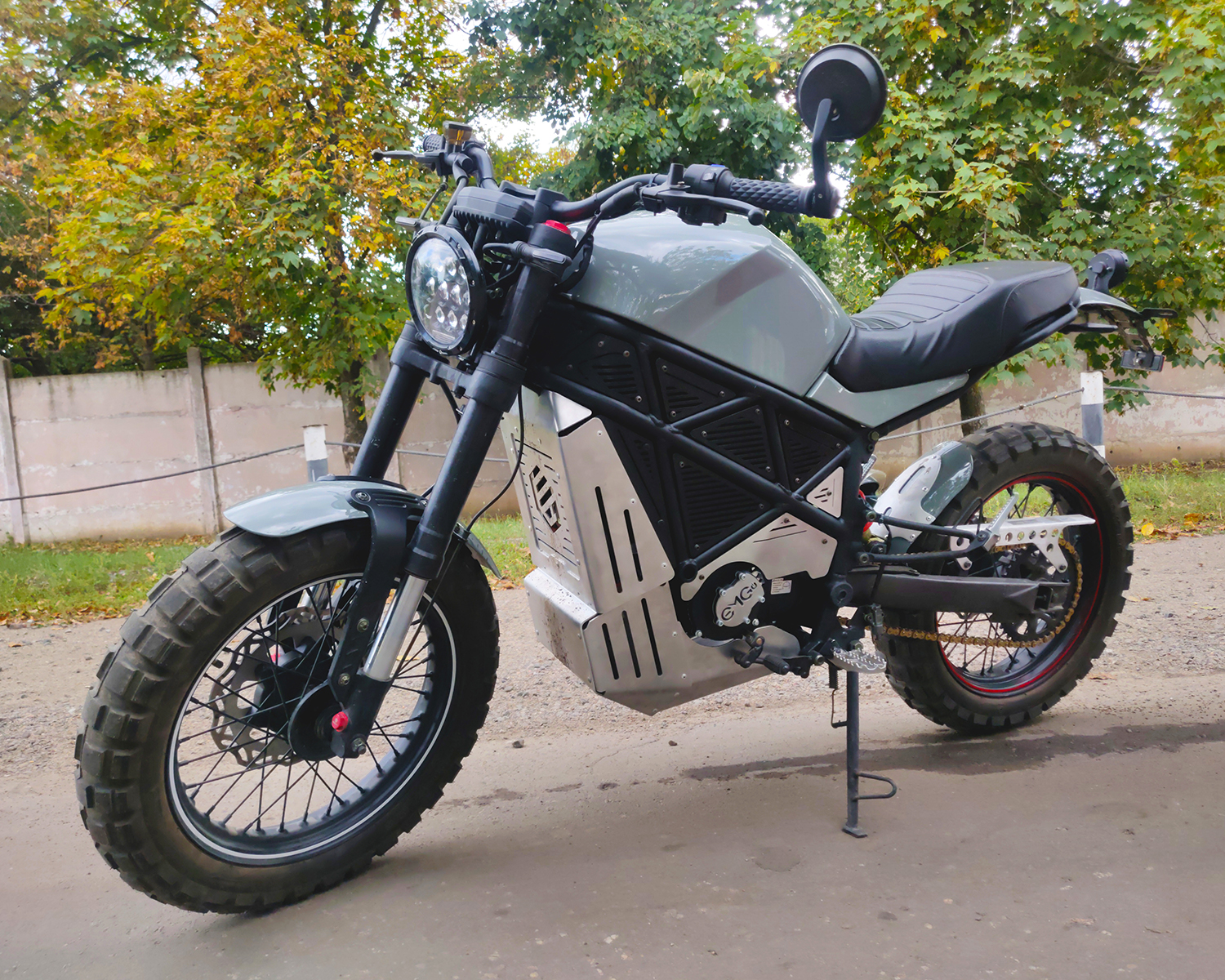 A side view of the ScrAmper - an electric motorcycle from Ukranian brand EMGo, capable of using an electric car charger