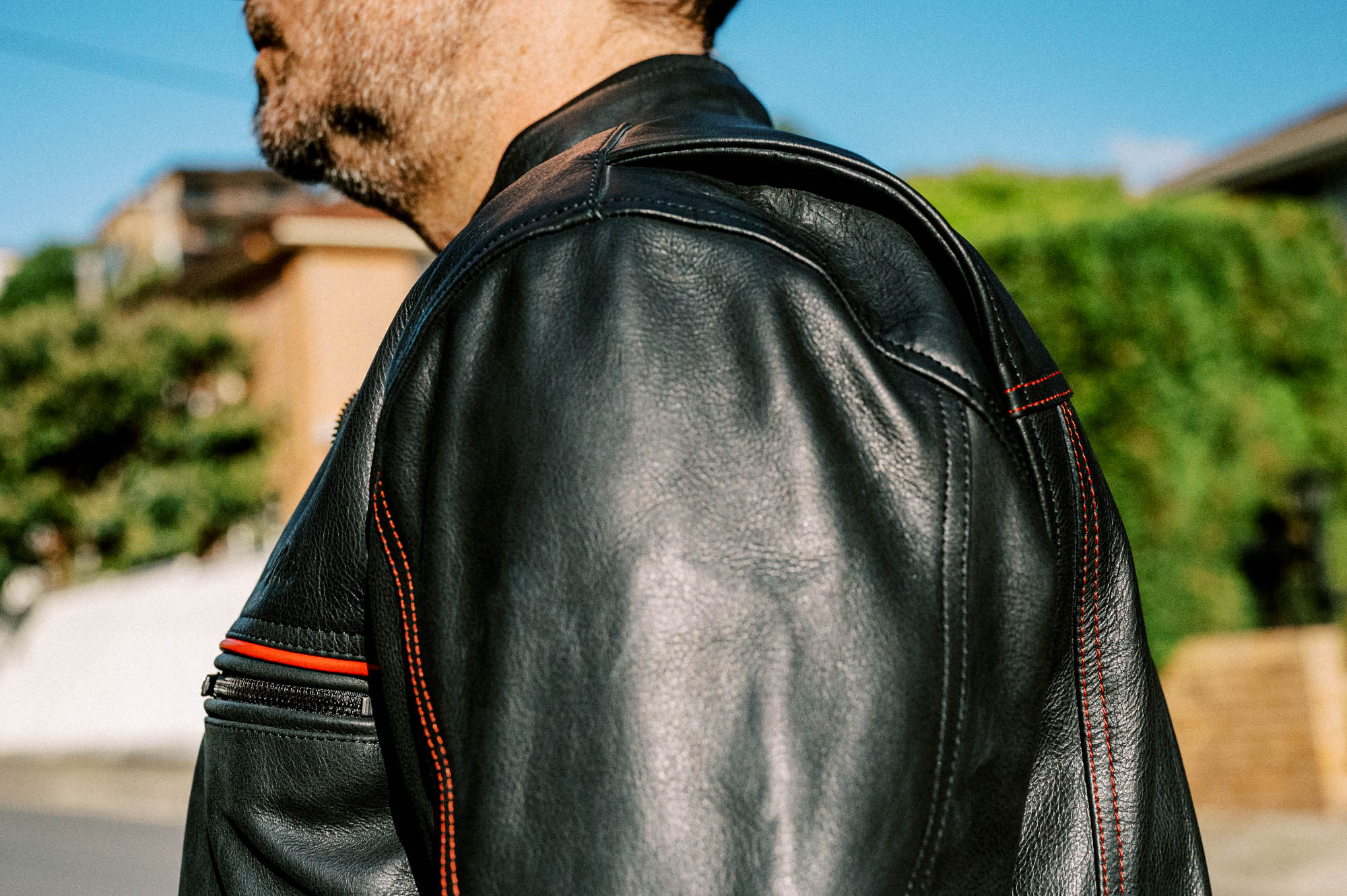 Black Pup Moto's new Rumbler Jacket on a rider - detail shot